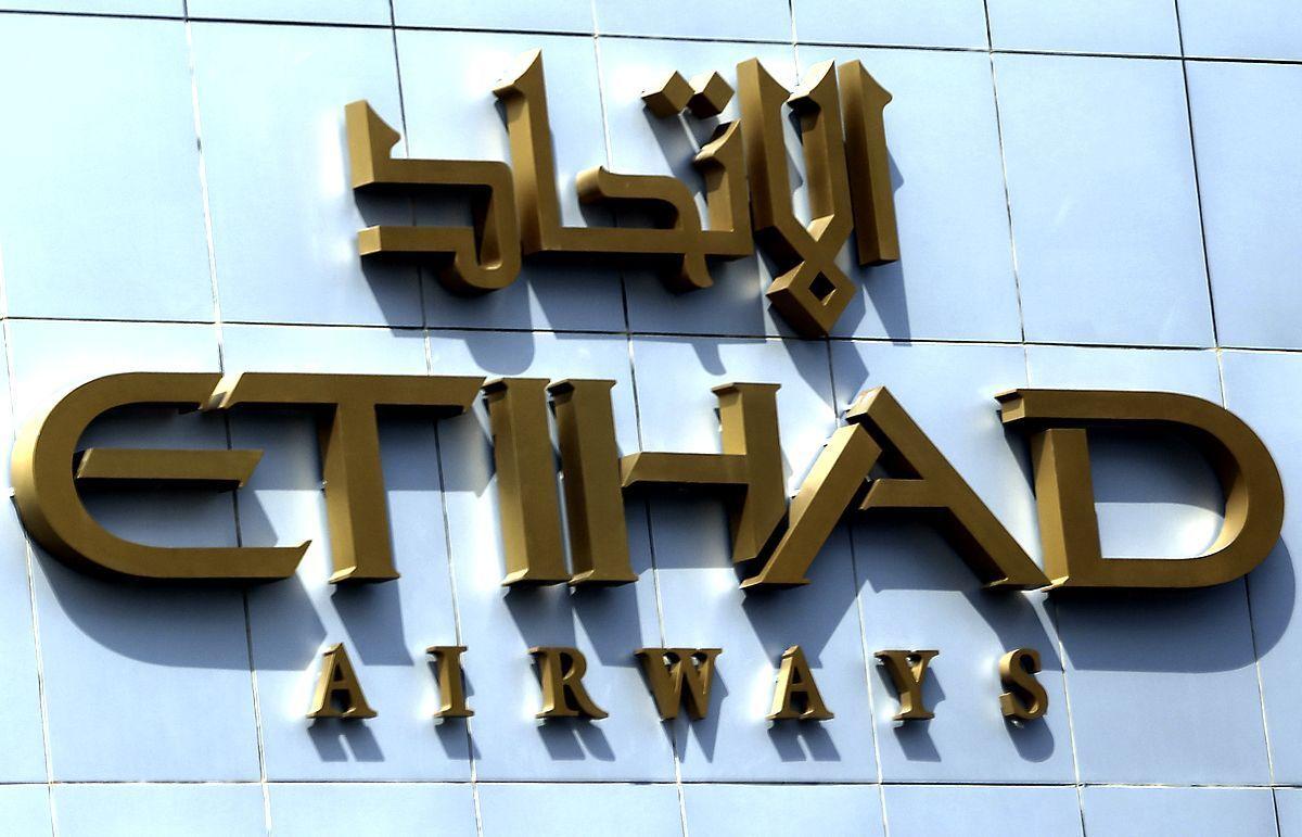 A picture shows the Etihad Airways logo at the airline's headquarters in the Emirati capital Abu Dhabi on October 14, 2012. Air France-KLM and Etihad Airways announced a codesharing agreement in the first phase of what could become a broader strategic partnership, a statement said. AFP PHOTO/KARIM SAHIB        (Photo credit should read KARIM SAHIB/AFP/GettyImages)